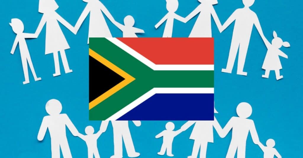 Blue background with paper dolls representing family members and South Africa flag.