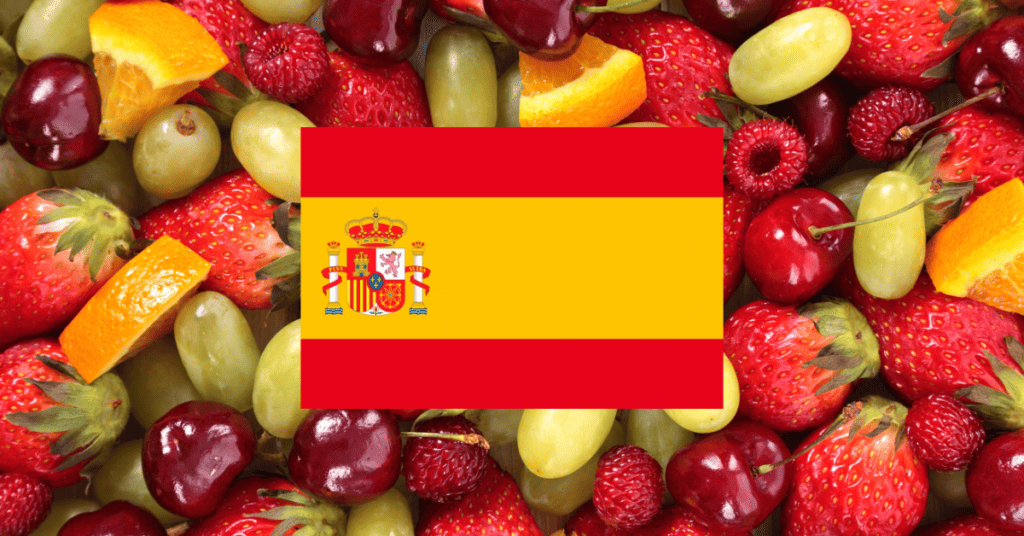 Background of various fruits with the Spain flag in the center